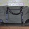leather and waxed canvas duffle bag